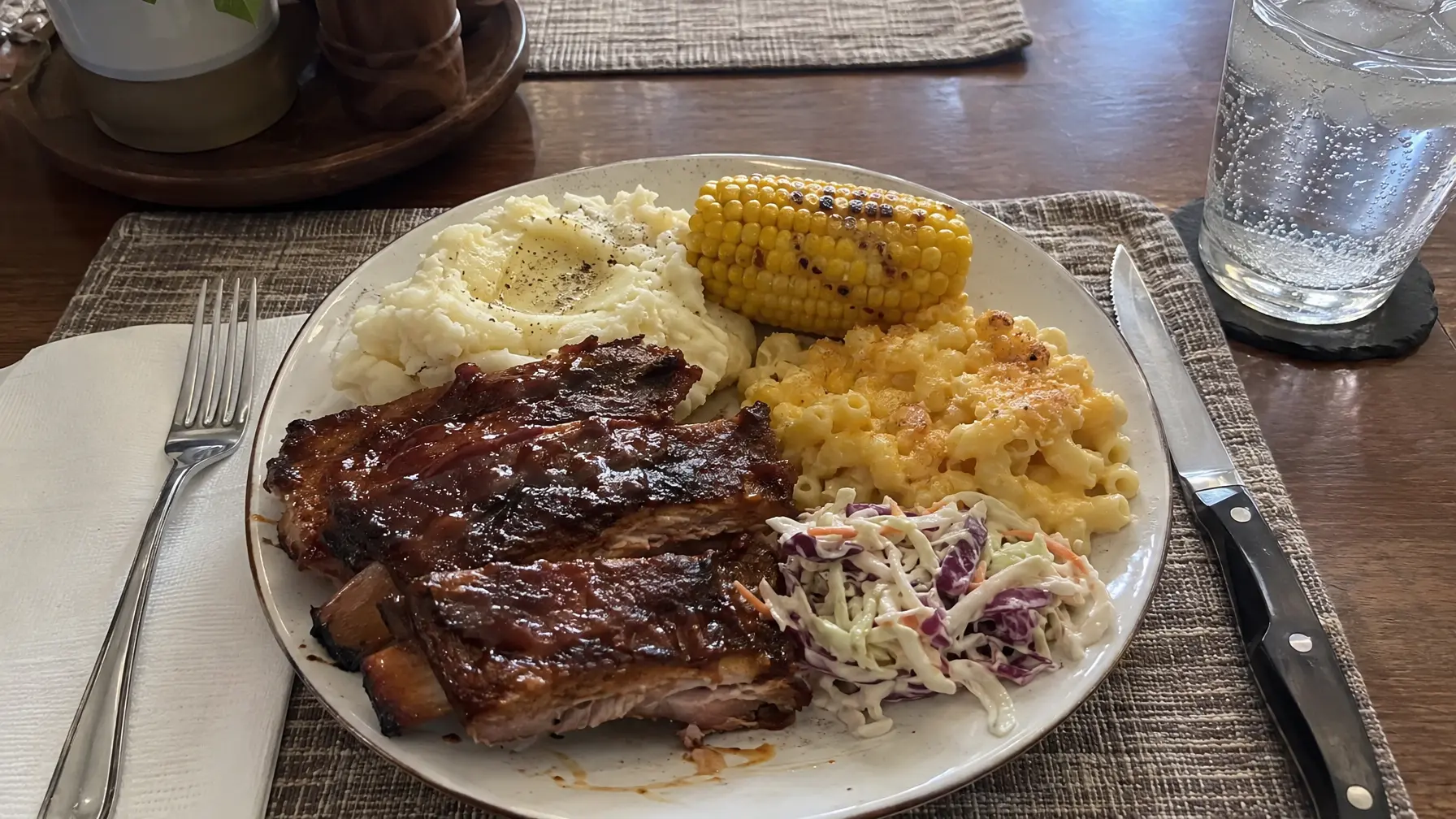 A home-cooked Sunday roast dinner plate with potatoes and vegetables